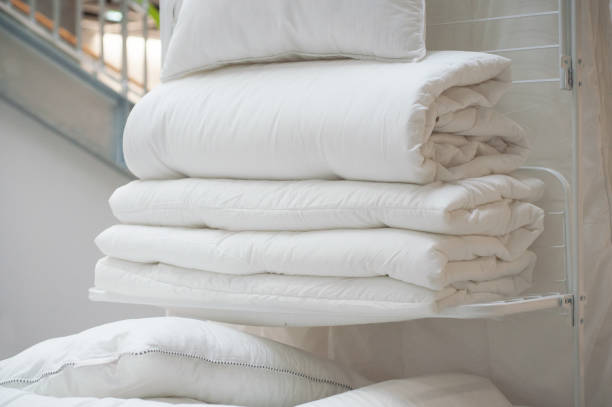 closeup of white duvet pile in decoration store